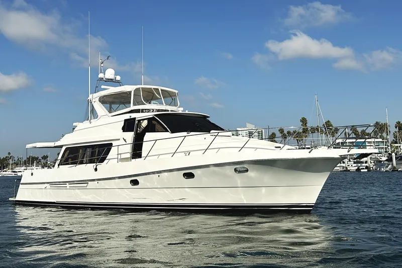 Slide: The Image of 2004 McKinna 57 PHMY Widebody yacht with stabilization on calm waters. - 5