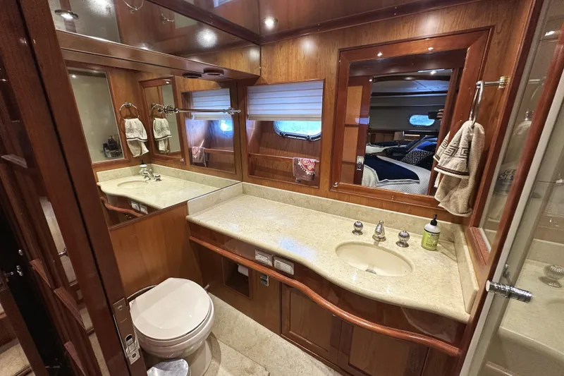 Slide: The Image of Luxurious bathroom in 2004 McKinna 57 PHMY yacht with wood accents and modern fixtures. - 78