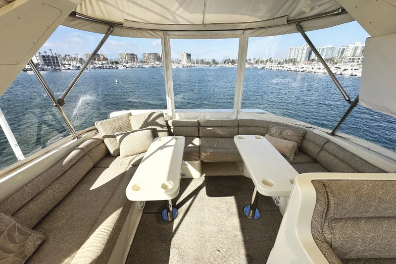 Slide: The Image of Luxurious interior of 2004 McKinna 57 PHMY yacht with waterfront view. - 91