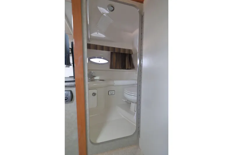 Slide: The Image of Interior view of 2006 Formula 330 Sun Sport boat bathroom with sink and toilet. - 24