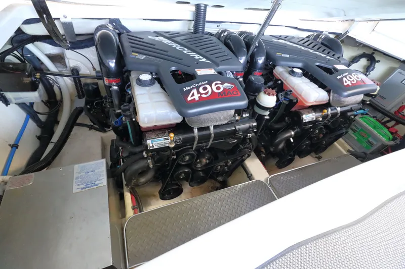 Slide: The Image of Twin MerCruiser 496 MAG engines in a 2006 Formula 330 Sun Sport boat. - 28