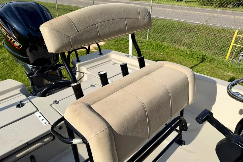 Slide: The Image of 2015 Blazer Bay 2200 Fisherman boat seating and engine detail. - 8