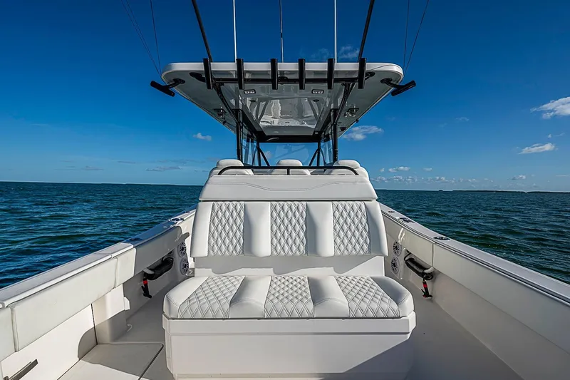 Slide: The Image of 2022 Invincible 39 Open Fisherman boat with luxurious seating on open water. - 63
