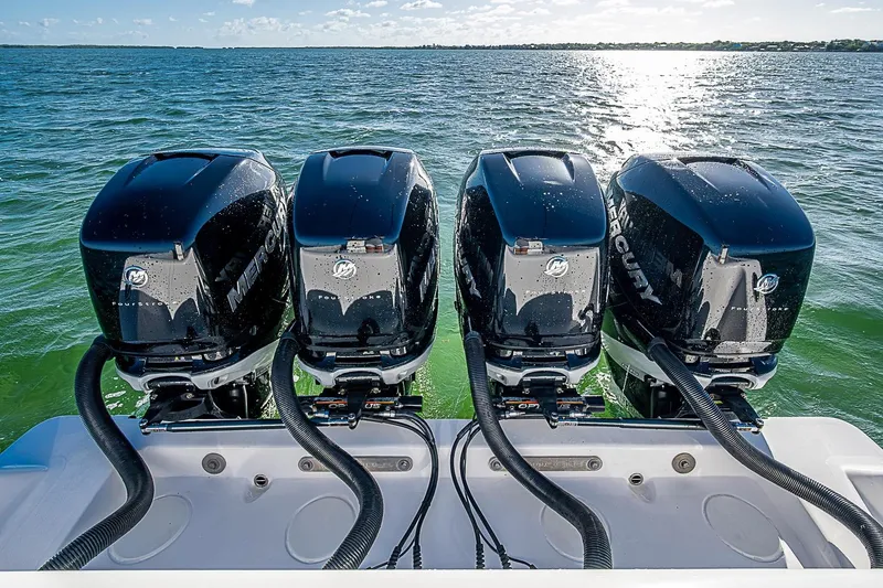 Slide: The Image of 2022 Invincible 39 Open Fisherman with four powerful Mercury outboard engines on open water. - 65