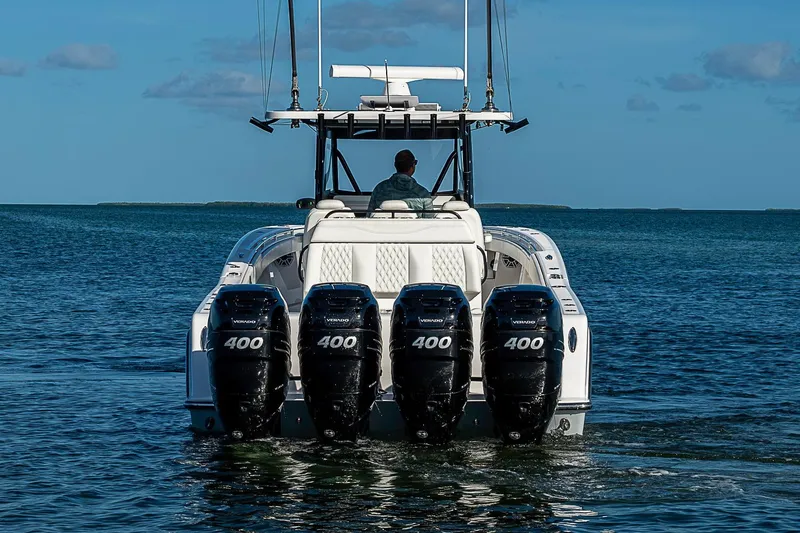 Slide: The Image of 2022 Invincible 39 Open Fisherman with four powerful outboard engines on the water. - 6