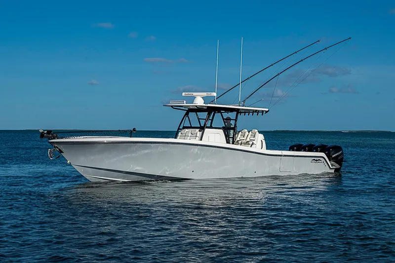 Slide: The Image of 2022 Invincible 39 Open Fisherman boat on calm ocean waters. - 17