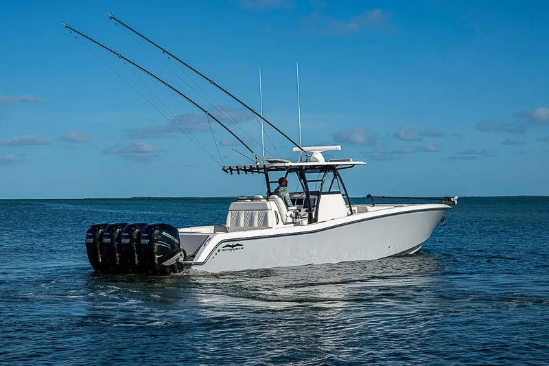 Slide: The Image of 2022 Invincible 39 Open Fisherman boat cruising on calm ocean waters. - 8