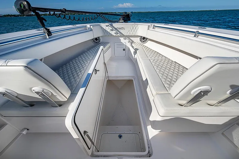 Slide: The Image of 2022 Invincible 39 Open Fisherman boat interior with open storage compartment. - 45