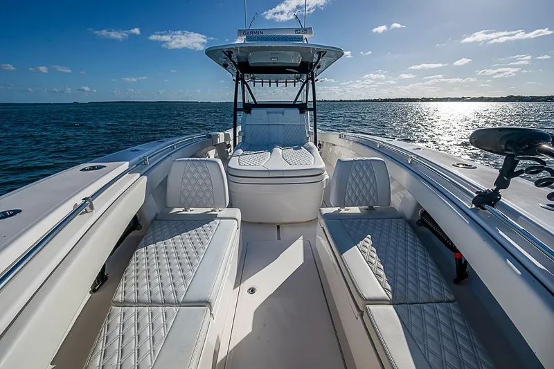 Slide: The Image of 2022 Invincible 39 Open Fisherman boat with luxurious seating on open water. - 50