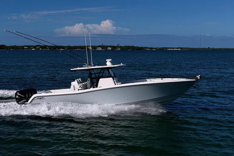 Slide: The Image of 2022 Invincible 39 Open Fisherman boat cruising on open water. - 23