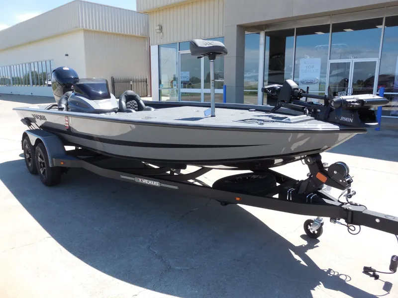 Slide: The Image of 2026 Vexus AVX 1980 boat on trailer outside a building. - 3