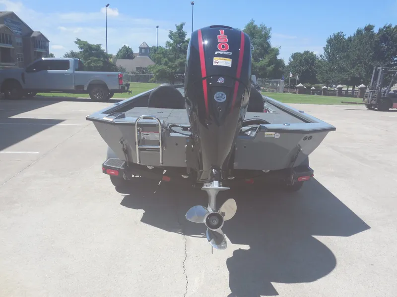 Slide: The Image of 2026 Vexus AVX 1980 boat with outboard motor in parking lot. - 5