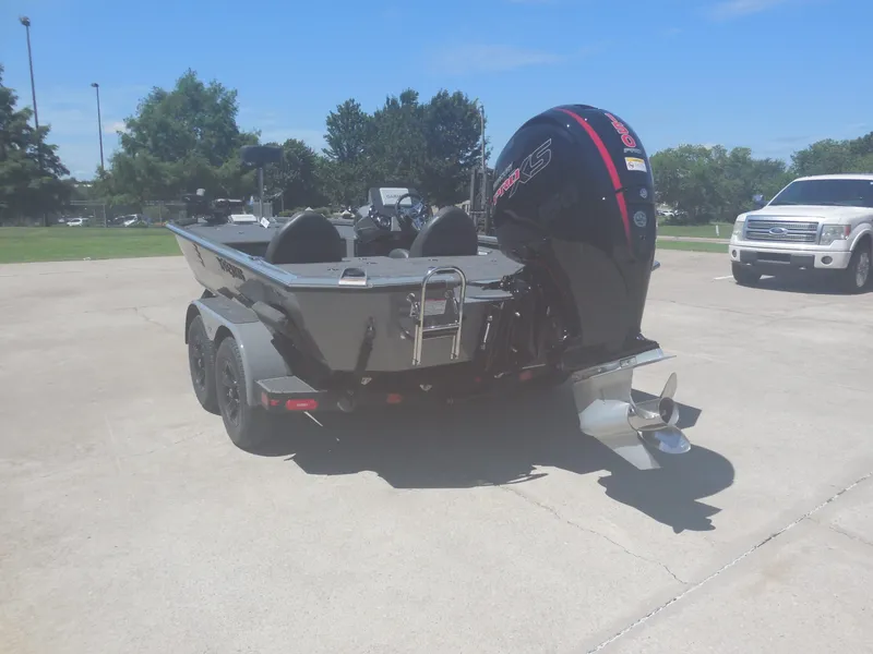 Slide: The Image of 2026 Vexus AVX 1980 boat on a parking lot. - 6