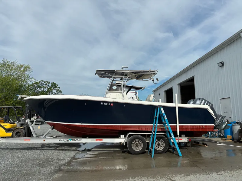 The Image of 2007 Sailfish 2660 boat on trailer outside warehouse. - 0