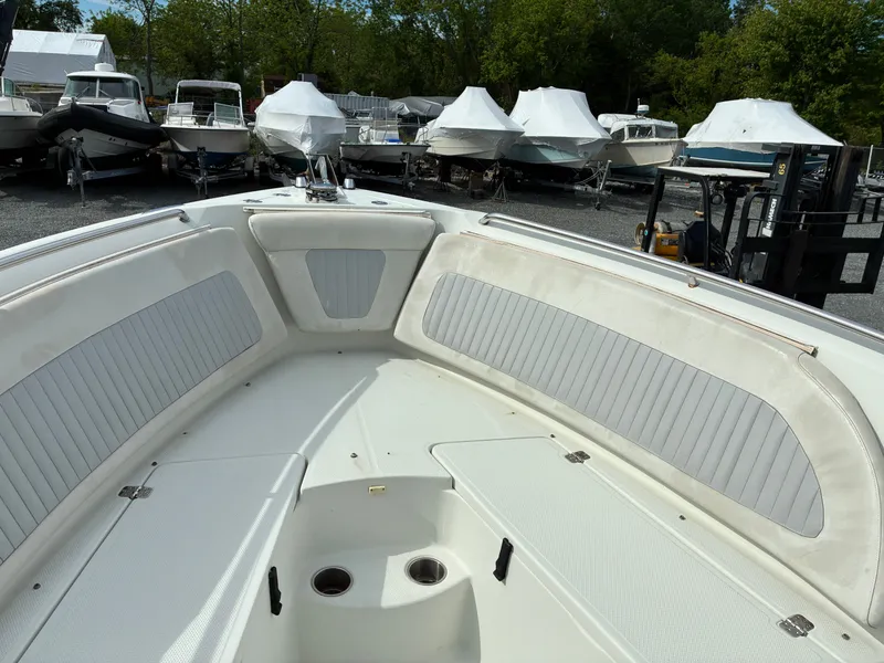 Slide: The Image of Interior view of a 2007 Sailfish 2660 boat in the marina. - 10