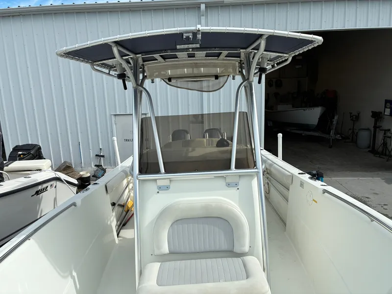 Slide: The Image of 2007 Sailfish 2660 boat parked in warehouse. - 12
