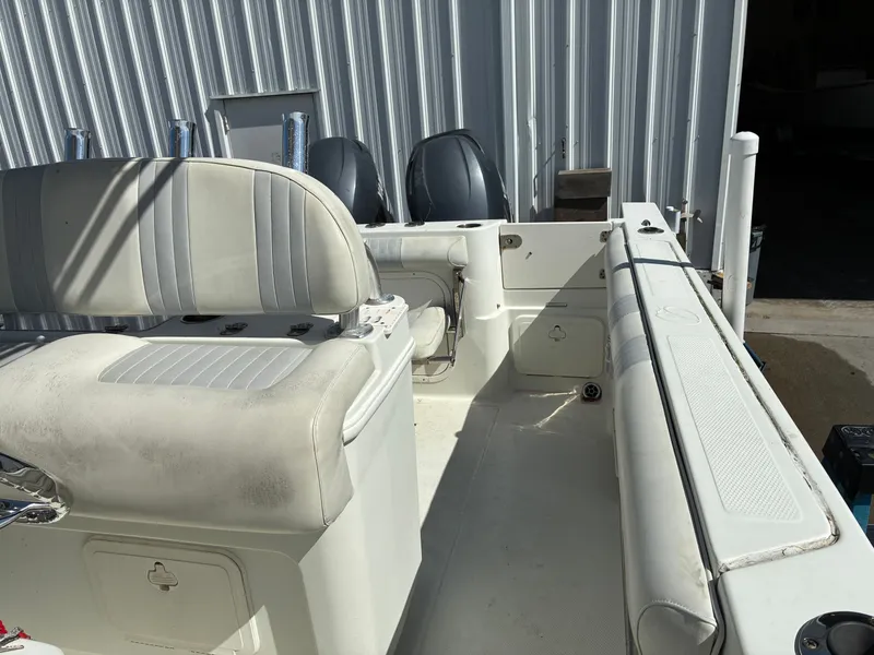 Slide: The Image of Interior of a 2007 Sailfish 2660 boat with seating. - 16
