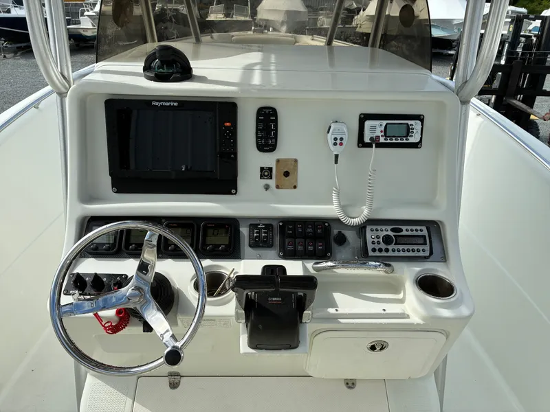 Slide: The Image of 2007 Sailfish 2660 boat helm with electronics and controls. - 17