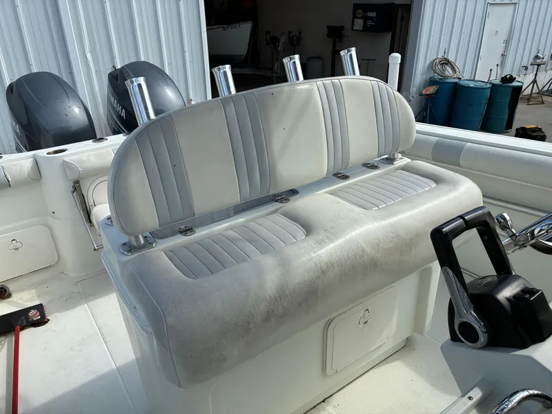 Slide: The Image of Interior of a 2007 Sailfish 2660 boat with seating and controls. - 18