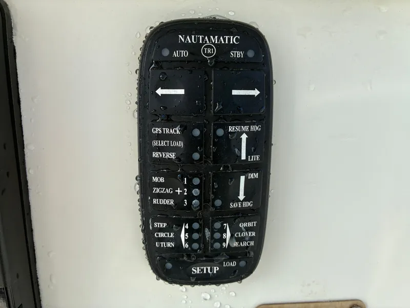 Slide: The Image of Nautamatic control panel on a 2007 Sailfish 2660 boat. - 26