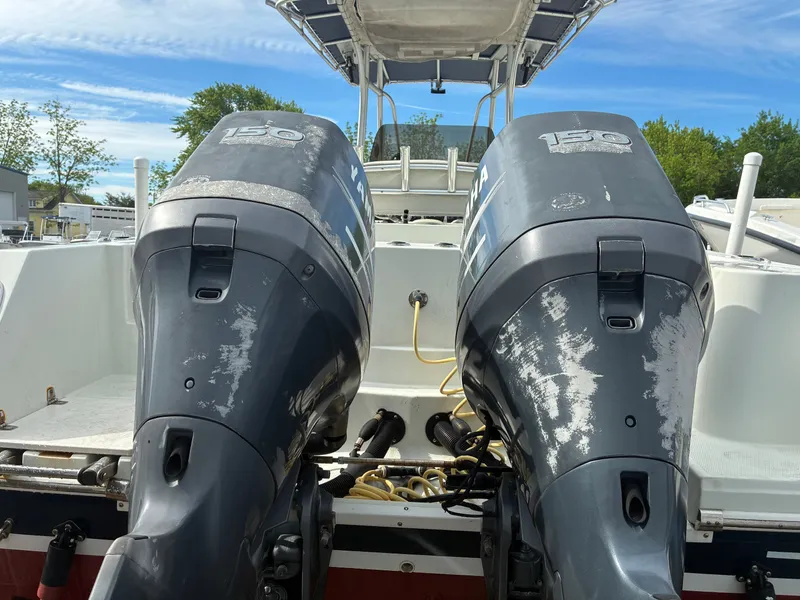 Slide: The Image of Two outboard motors on a 2007 Sailfish 2660 boat. - 8