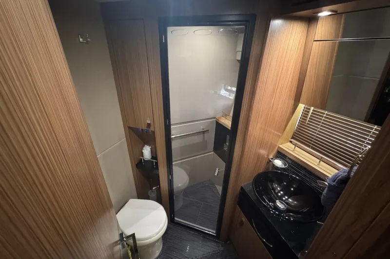 Slide: The Image of Luxurious bathroom interior of 2016 Sea Ray L590 Fly yacht with modern fixtures. - 19
