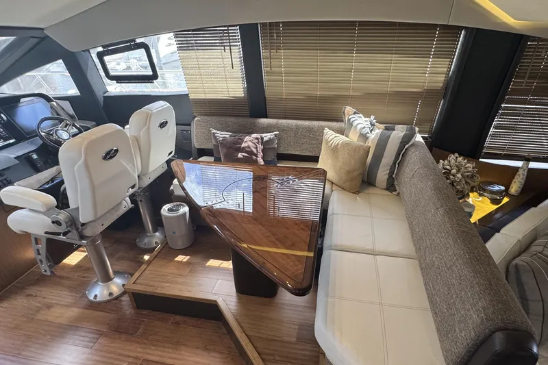 Slide: The Image of Luxurious interior of 2016 Sea Ray L590 Fly yacht with plush seating and elegant decor. - 29