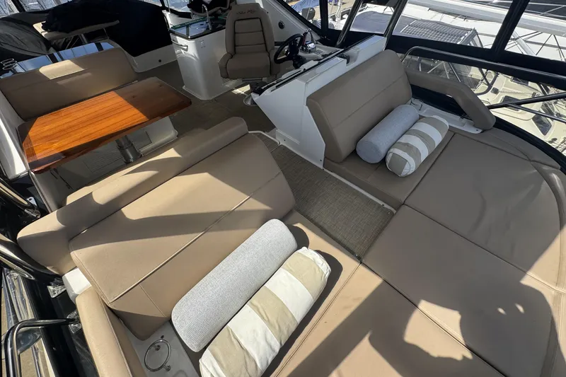 Slide: The Image of Luxurious bedroom interior of 2016 Sea Ray L590 Fly yacht with elegant bedding and decor. - 33