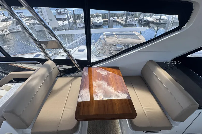 Slide: The Image of Cummins generator service data on a 2016 Sea Ray L590 Fly yacht. - 52