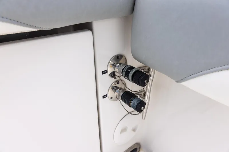 Slide: The Image of Close-up of 2022 Regulator 28 boat's port and starboard fuel inlets. - 53