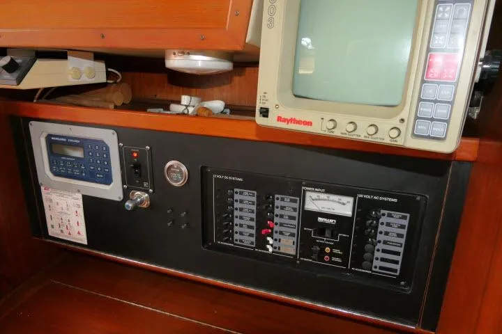 Slide: The Image of Control panel of a 1988 Irwin 38-2 sailboat with navigation equipment. - 16