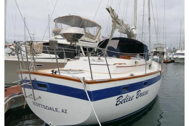 Slide: The Image of 1988 Irwin 38-2 sailboat named "Belize Breeze" docked in Scottsdale, AZ marina. - 60