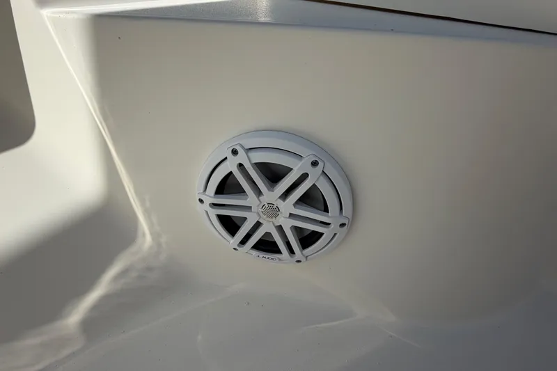 Slide: The Image of White speaker installed on a 2022 Pathfinder 2600 HPS boat interior. - 16