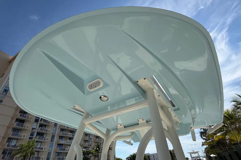 Slide: The Image of 2022 Pathfinder 2600 HPS boat's underside view with clear sky background. - 19