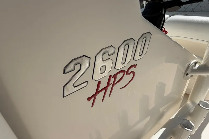Slide: The Image of Close-up of 2022 Pathfinder 2600 HPS boat model emblem in sunlight. - 20