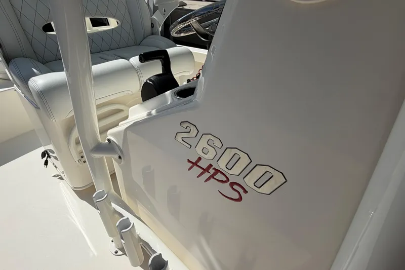 Slide: The Image of 2022 Pathfinder 2600 HPS boat interior with seating and control panel. - 21