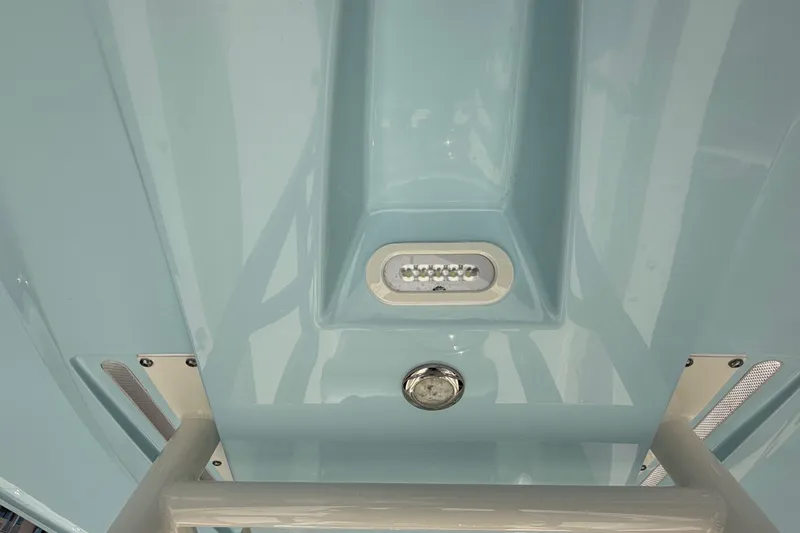 Slide: The Image of 2022 Pathfinder 2600 HPS boat hull with integrated LED light and sleek design. - 22