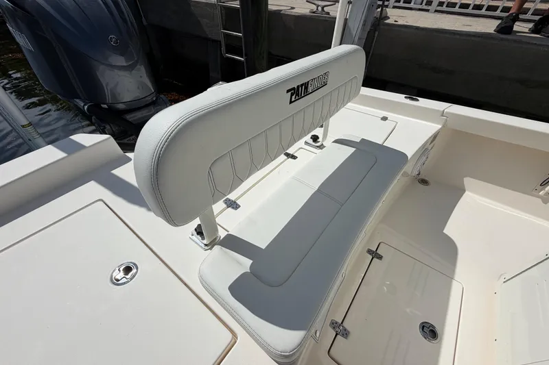 Slide: The Image of 2022 Pathfinder 2600 HPS boat interior with seating and Yamaha outboard motor. - 44