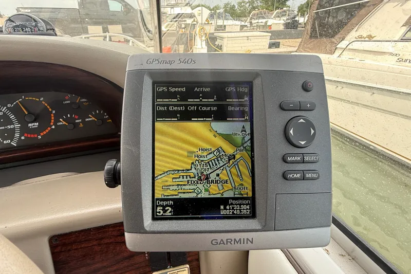 Slide: The Image of Garmin GPSmap 540s on 1998 Four Winns 258 Vista boat dashboard, displaying navigation map. - 14