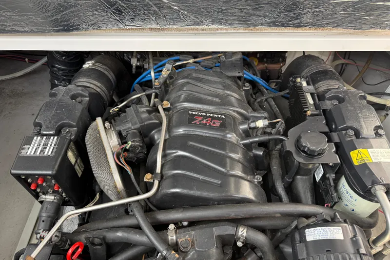 Slide: The Image of Engine compartment of a 1998 Four Winns 258 Vista with Volvo Penta 7.4G motor. - 32