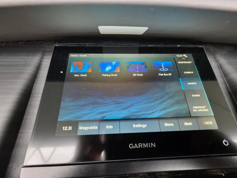 Slide: The Image of Garmin display on 2022 Bennington 25LSB boat showing navigation options. - 18