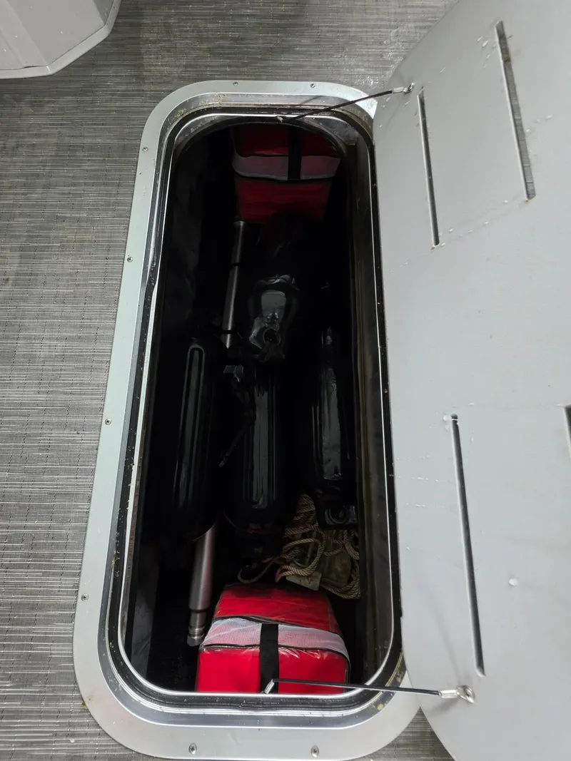 Slide: The Image of Storage compartment in Bennington 25LSB boat, year 2022. - 35