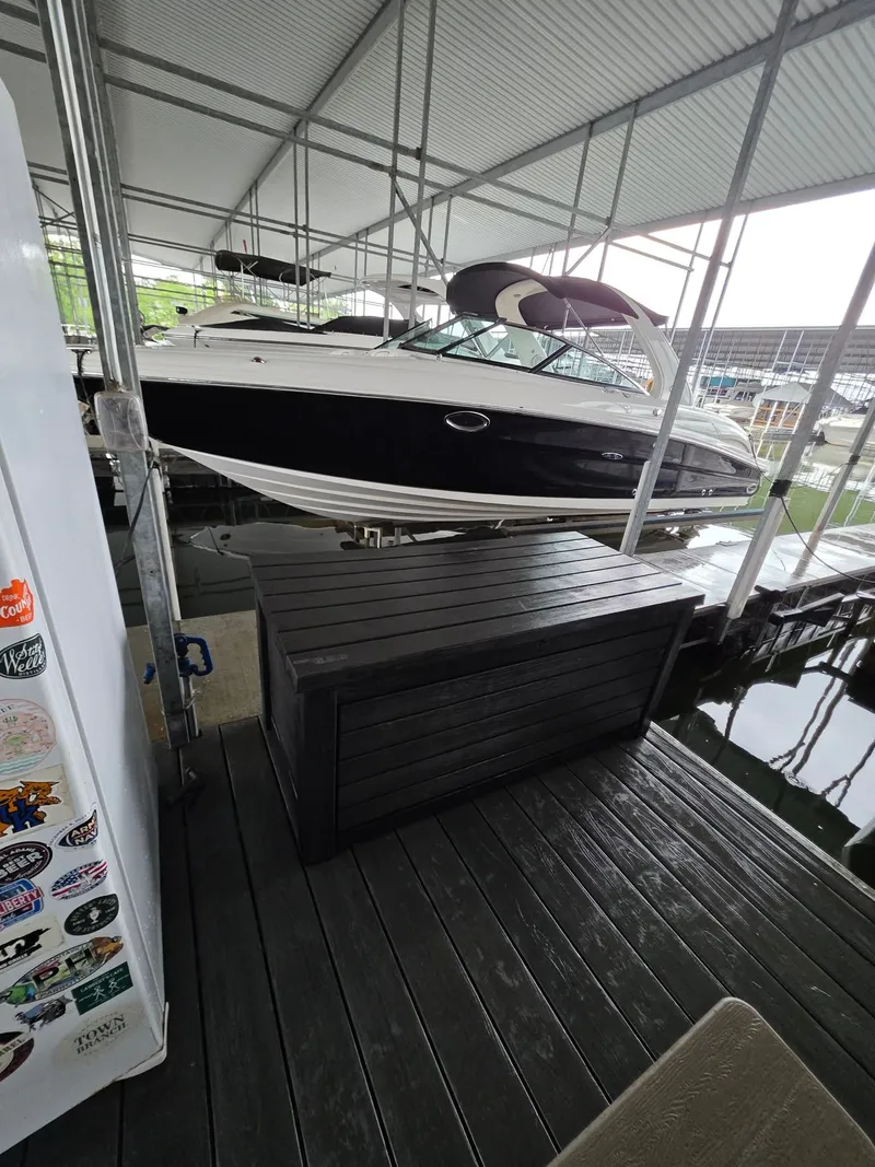 Slide: The Image of Bennington 25LSB 2022 boat in covered dock. - 45
