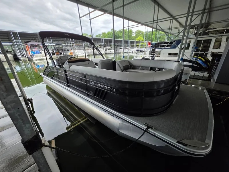 Slide: The Image of Bennington 25LSB 2022 pontoon boat docked at marina. - 6