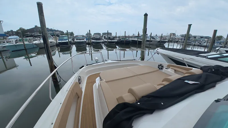 Slide: The Image of View from the bow of a Sea Ray Sundancer 320 Outboard in a marina. - 26