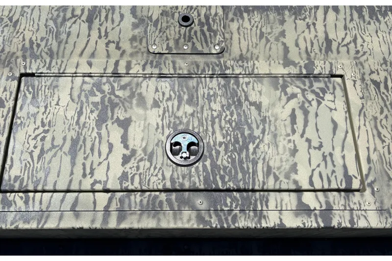Slide: The Image of Camouflage-patterned deck of 2026 Tracker Grizzly 1860 Utility boat with hatch detail. - 16