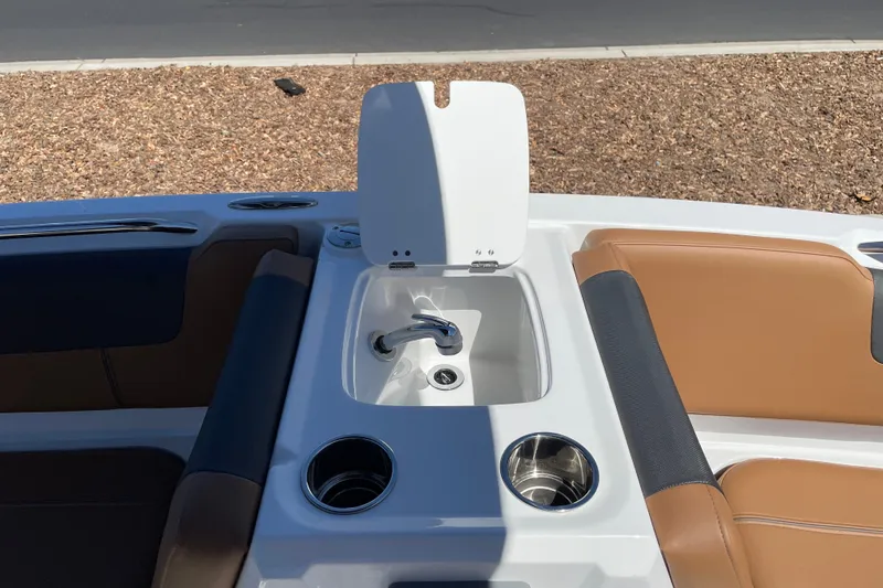 Slide: The Image of Tahoe 1950 boat interior with sink and cup holders, 2026 model. - 27