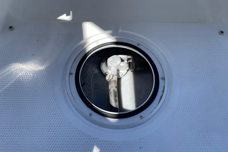 Slide: The Image of Circular hatch on Tahoe 1950 boat, 2026 model, with textured white surface. - 23