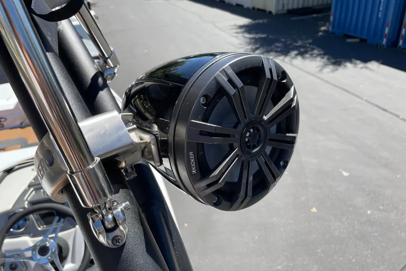 Slide: The Image of Close-up of a Kicker speaker mounted on a Tahoe 1950 boat, 2026 model. - 37