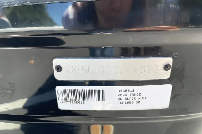 Slide: The Image of 2026 Tahoe 1950 model with black hull identification plate and barcode. - 150